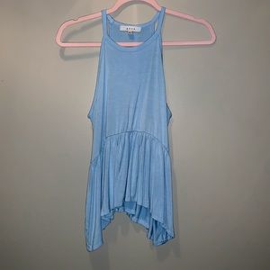 Selling a flowy tank top has been worn only once and in new condition.
